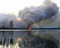 Canberra fire downgraded as heatwave eases