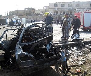 Car bomb hits Iraq police station where 24 killed