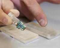 Amputee feels texture with a bionic fingertip