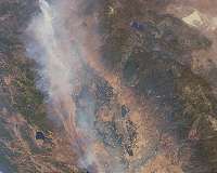 California scorched by raging wildfires the size of LA