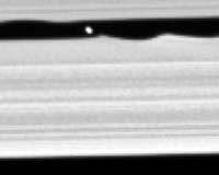 Cassini Finds New Saturn Moon That Makes Waves