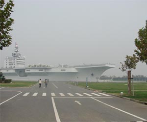 Beijing's aircraft carrier returns from South China Sea