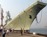 China gives US defence chief a tour of its aircraft carrier