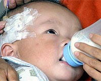 Tainted milk sickens 6,000 babies in China