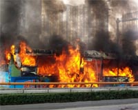 Suspect held after China bus fire kills 17: media