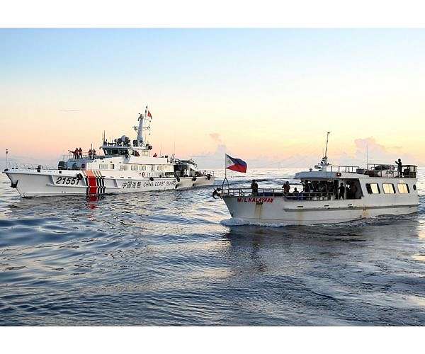 Philippines says 'we have not lost' South China Sea reef after pullout