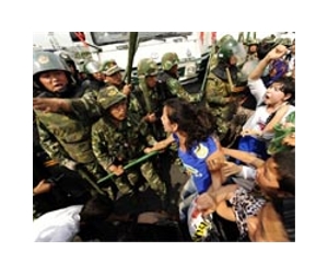 Show of police force after China migrant protest