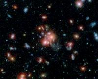 NASA Telescopes Find Galaxy Cluster with Vibrant Heart