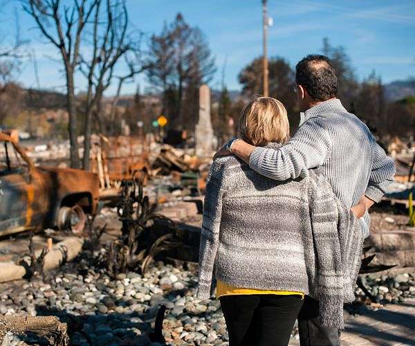 Fires near Athens under control as new blazes rage in Greece