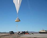 Boeing delays capsule's first space test flight