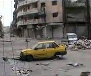 Warplanes batter Syria's Homs as Turkey returns fire