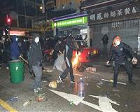 Over 30 Hong Kong protesters in court over riot