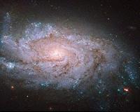 Hubble Sees a Spiral Home to Exploding Stars