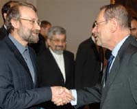 Larijani warns IAEA that Iran could revise cooperation