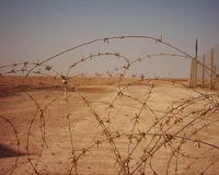 For Iran, Iraq's unrest is plot to undo bilateral ties