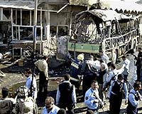 Woman suicide bomber kills 35 by Baghdad shrine