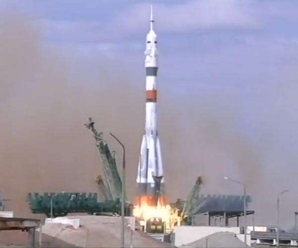 Russian crew blast off to film first movie in space