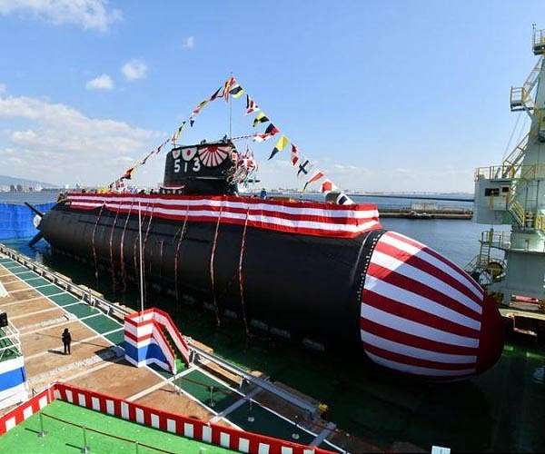 Japan changes rules to allow aid to foreign militaries