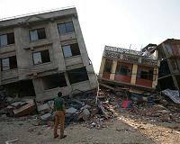 'Poor like us suffer': Nepal quake survivors struggle in crammed homes