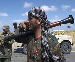 Libyans surrender hundreds of weapons to army