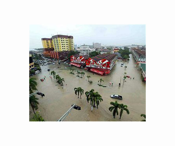 Malaysian villagers escape floods on excavator as 28,000 evacuated