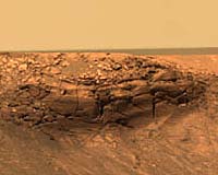 Mars Rover Inspects Stone Ejected From Crater