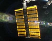 Atlantis astronauts unfurl new solar arrays on space station