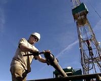 Japan, U.S. rigs ding oil prices