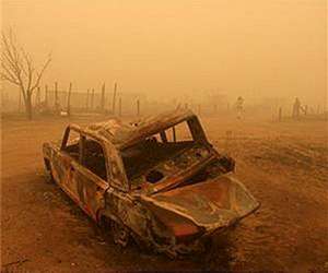 Disasters show 'screaming' need for action - climate chief