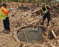 Searchers comb wreckage for Samoan tsunami dead
