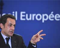 Sarkozy pushes ahead with unpopular carbon tax