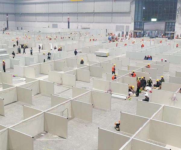 Xi praises China's virus handling as Shanghai prepares 130,000 Covid beds