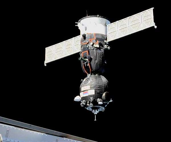 Soyuz spacecraft that will bring ISS crew back to Earth moved to new port