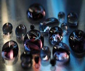 Milikelvins drive droplet evaporation