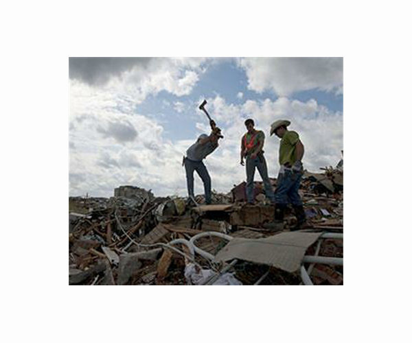 After deadly tornadoes, stricken Kentucky town organizes to help their own