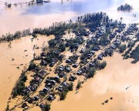 Vietnam hit by flooding, toxic sludge from coal plants