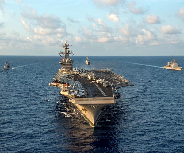 USS Carl Vinson, carrier strike group deploy from San Diego