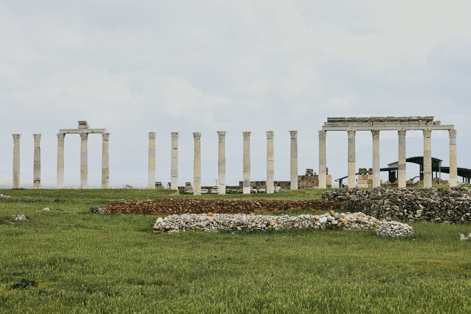 How did a hilltop sanctuary in southeastern Anatolia, built with 5-metre limestone pillars around 9600 BCE, predate Stonehenge by roughly 6,000 years without metal tools, pottery, or the wheel?