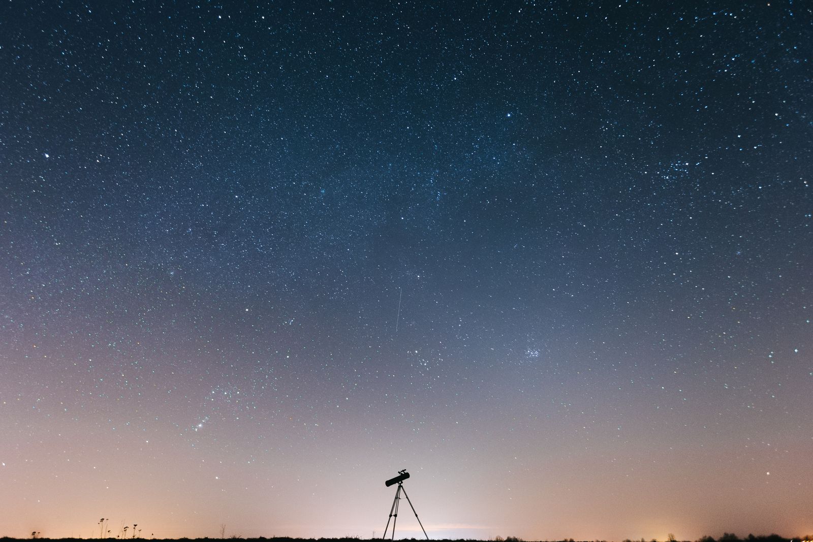 In 1610, Galileo turned a homemade telescope toward Jupiter and sketched four points of light that seemed to shift positions each night, and within a week he realised he was watching moons orbit another world — the first direct evidence that not everything circled Earth