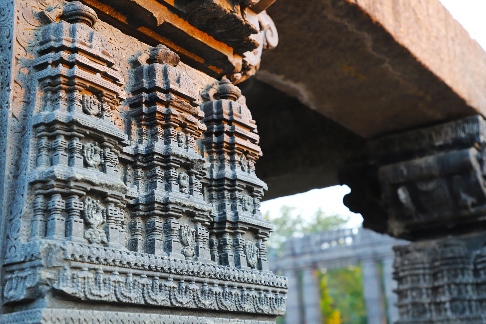 T-shaped limestone pillar carving