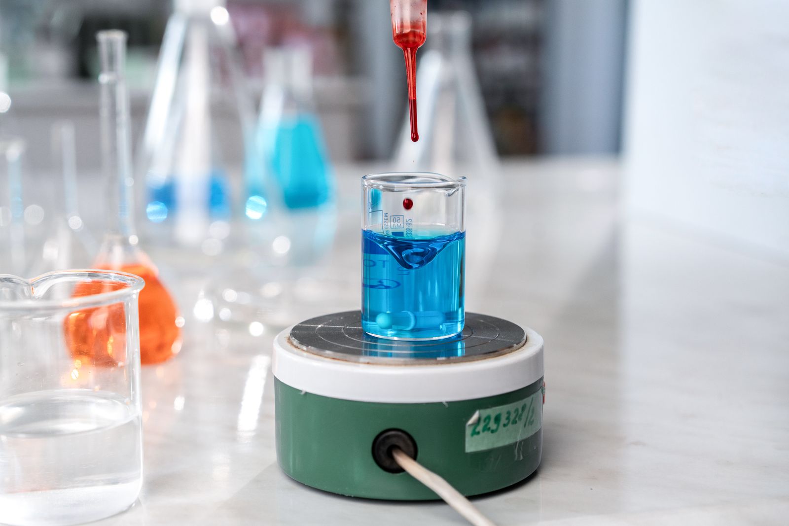 In 1952, Alfred Hershey and Martha Chase put a kitchen Waring blender to work at Cold Spring Harbor, spinning virus-infected bacteria fast enough to shear off the protein coats while leaving the injected DNA inside, and settled a decades-long argument by showing that genes are made of nucleic acid, not protein